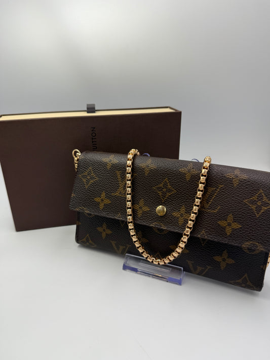 Louis Vuitton Monogram Coated Canvas International Wallet TH0938