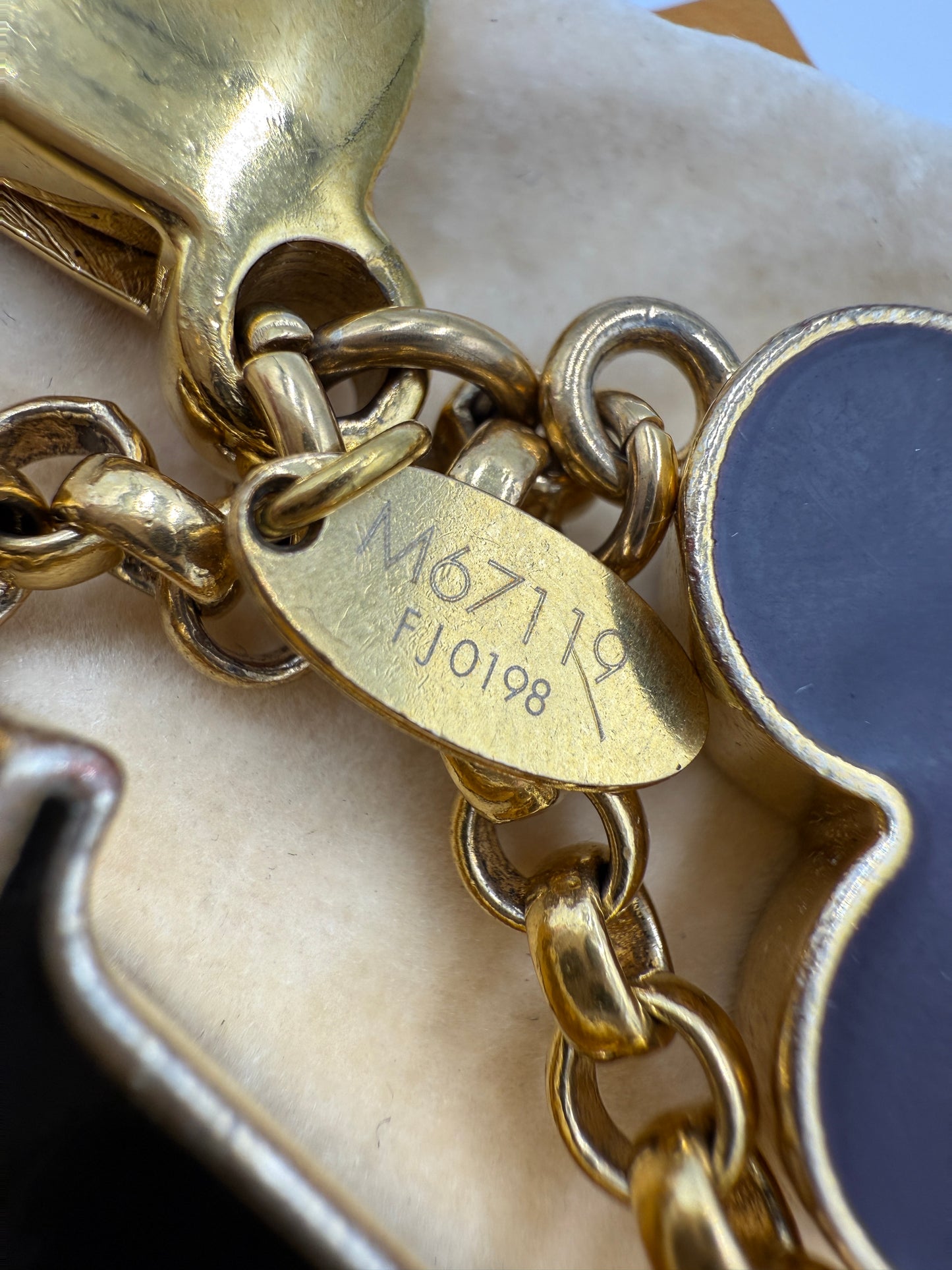 Louis Vuitton Brass Fleur De Monogram Bag Charm FJ0198