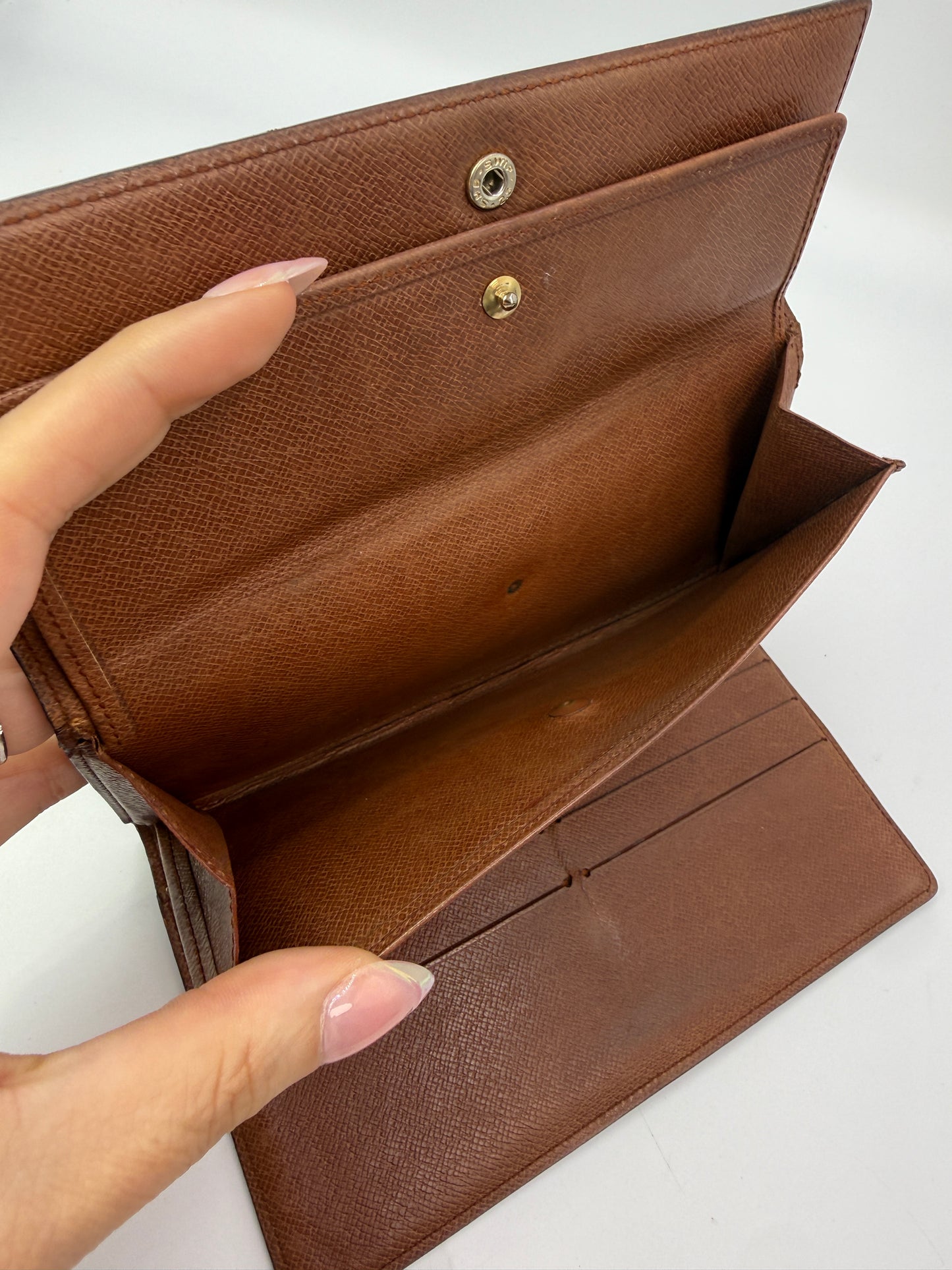 Louis Vuitton Monogram Coated Canvas International Wallet MI884